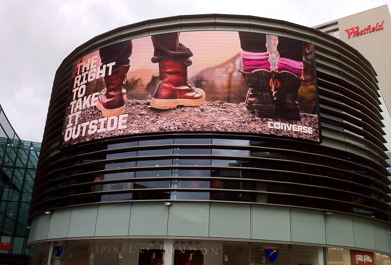 Curved digital screen on the front of a shopping centre