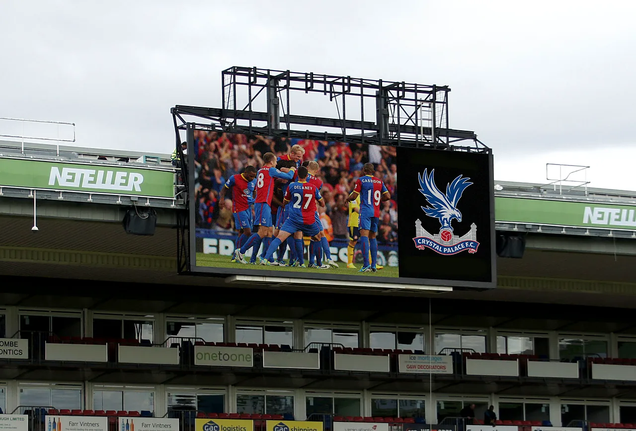 LED big screen above a football stadium stand