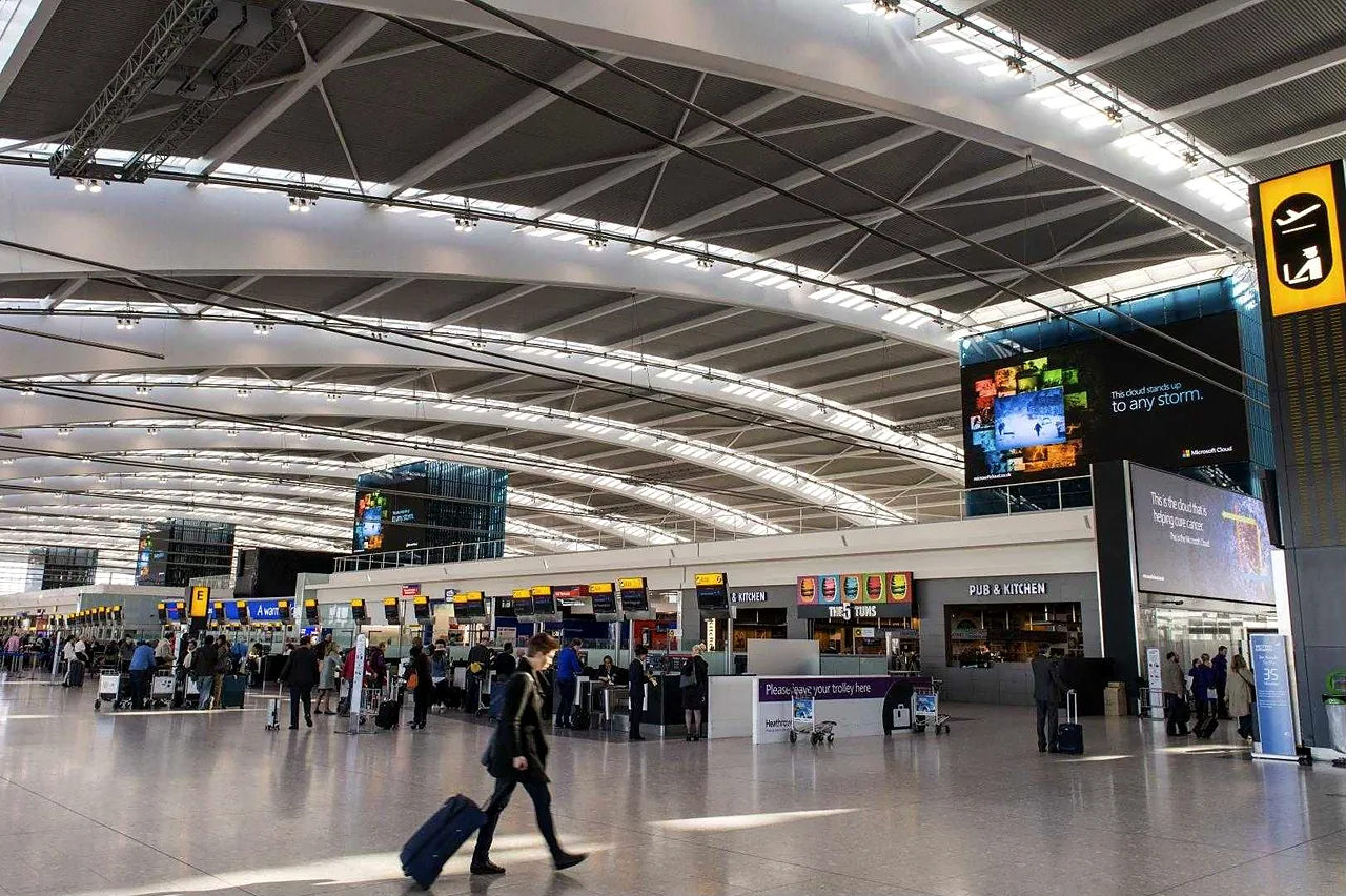 LED towers above the check-in hall at Heathrow Terminal 5