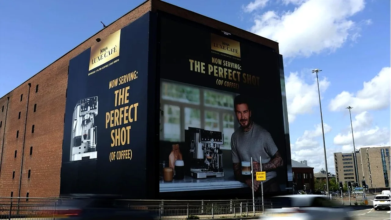 Ninja Luxe Café campaign across the banner and full-motion screen on the Victoria Warehouse